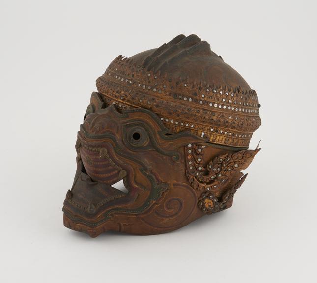 Grotesque actor's head mask, gilded and painted brass, Thai