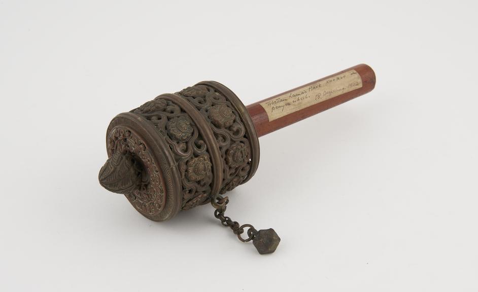 Copper and brass prayer wheel with wooden handle, Tibetan