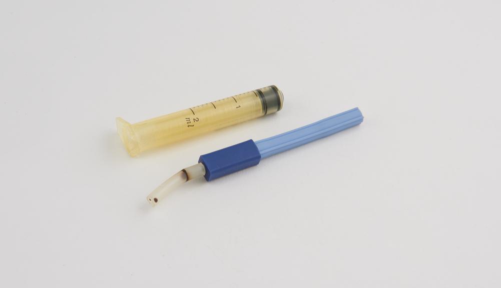 Needle and syringe (broken) by B.D.  Plastipak (country?), 1982.