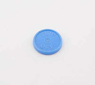 Lid, blue plastic marked "Flip Off".