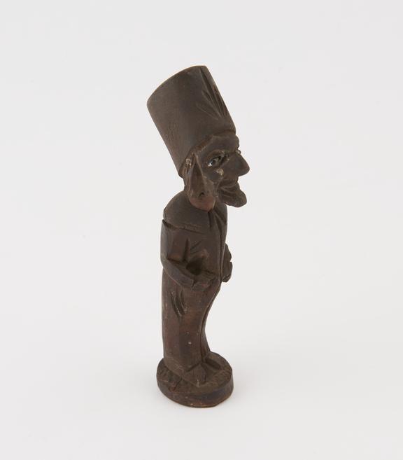 Wood tobacco pipe with pipe stand, bowl in form of head
