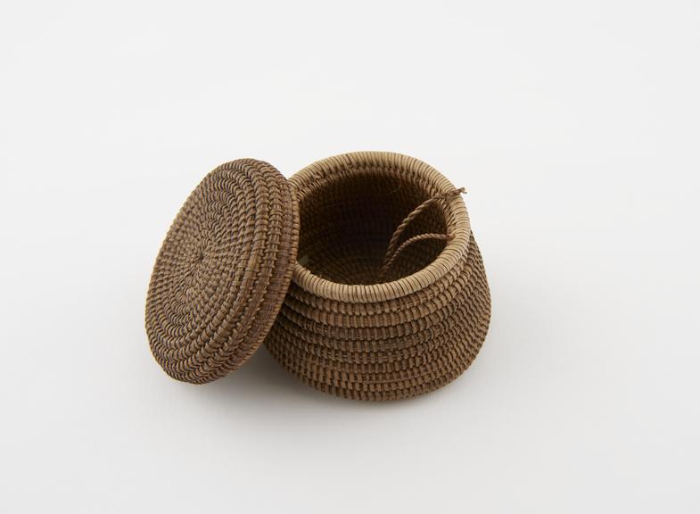 Medicine basket of coiled grass with matching lid