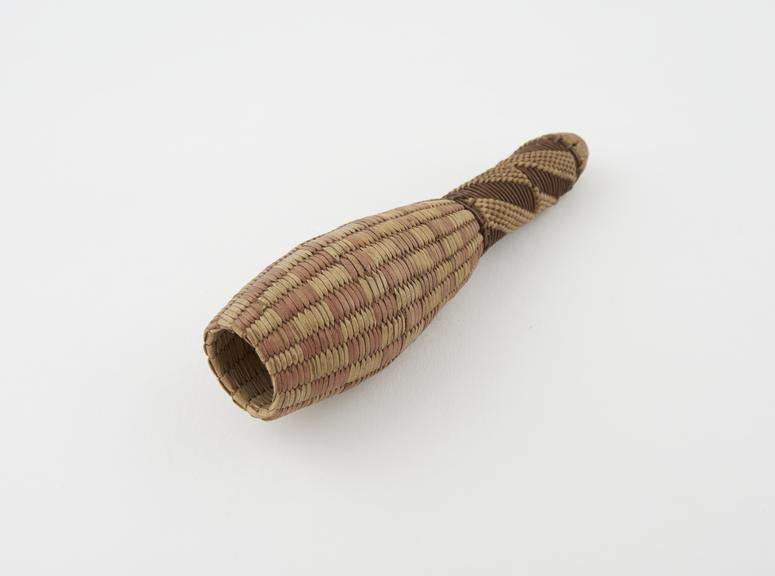 Penis sheath, case of woven grass