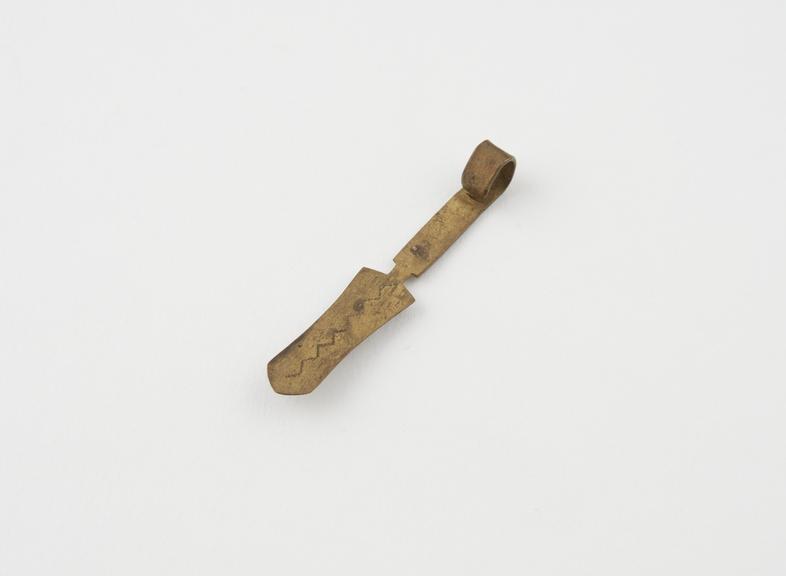 Small brass strigil, Christol collection, from Zambia, 1850-1930