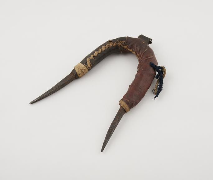 Medicine man's weapon, horseshoe shaped