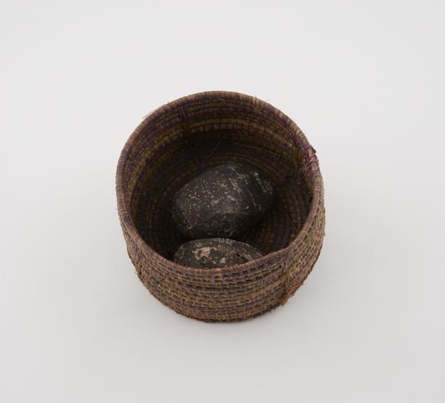 Basket, cane, containing 2 lumps of medicine, West Africa