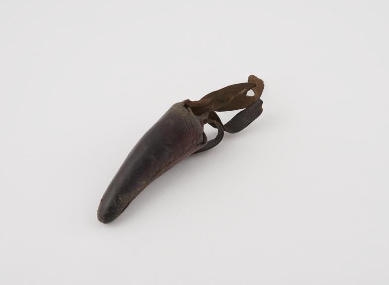 Leather covered horn for carrying medicine, with belt strap