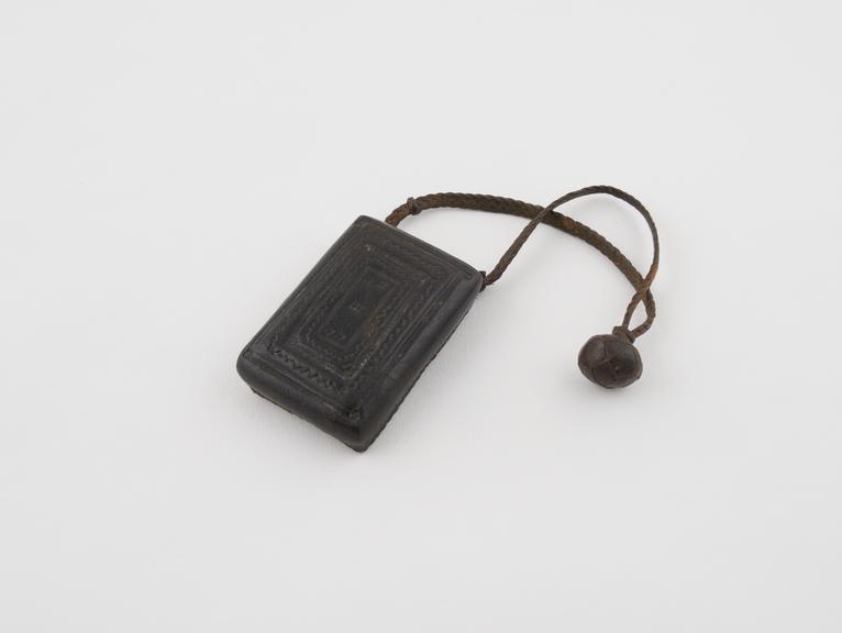 Leather necklet stuffed with cloth ?