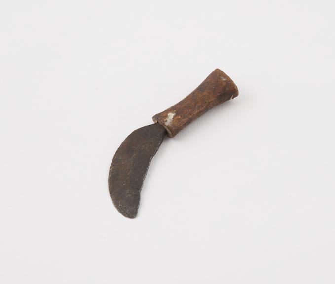 Clitoridectomy knife, metal and wood, from Banda tribe, Ganza