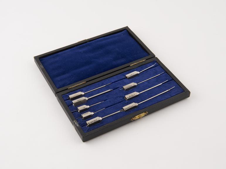 Nine hypodermic needles in case, Agla' brand