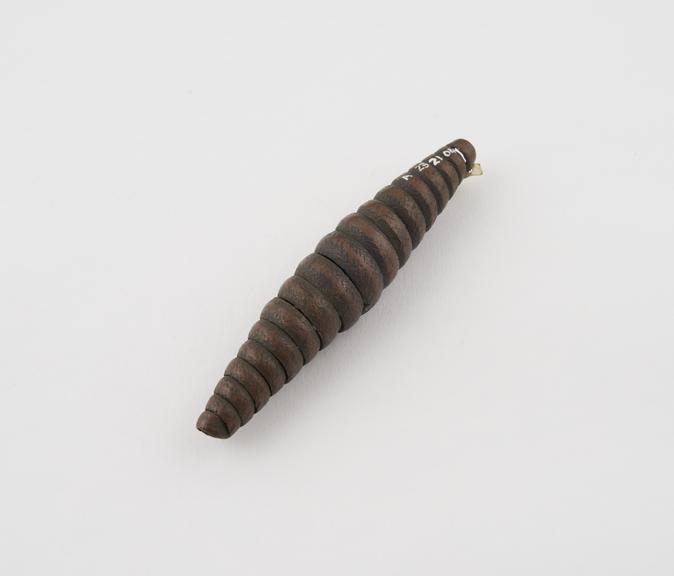 Amuletic pendant, made of spiralled copper strip, Congolese