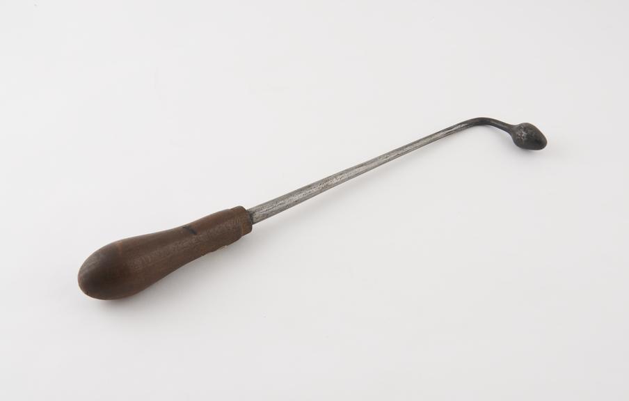 Firing iron, steel, with wooden handle, British(?), 1801-1900