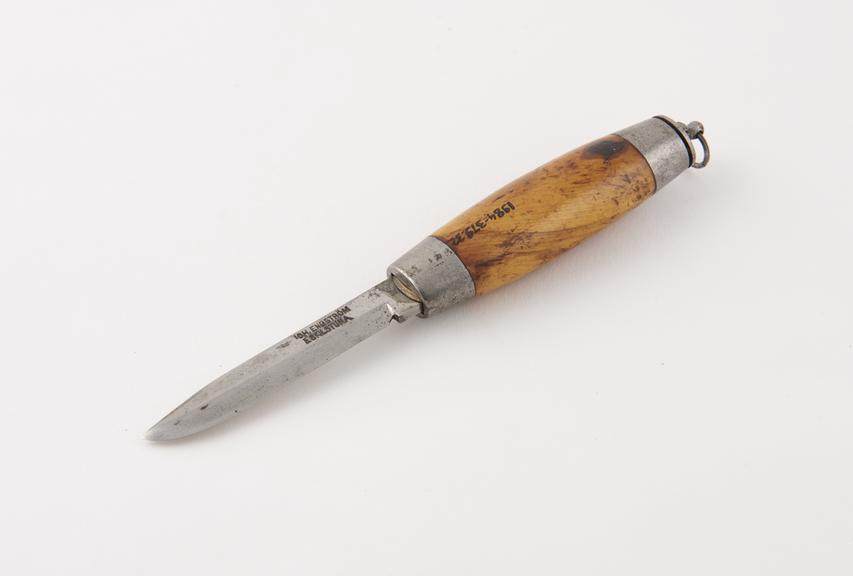 Pocket knife, steel blade in brass frame