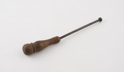 Cautery, steel and wood