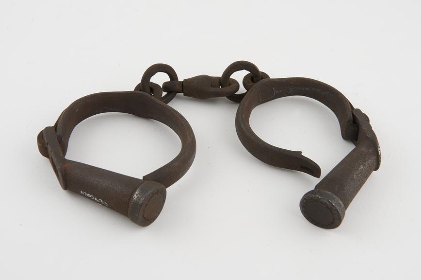 Handcuffs, iron, English, 18th to 19th centuries