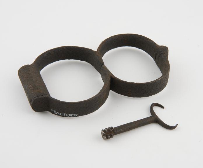 Handcuffs, iron, English, 18th to 19th centuries