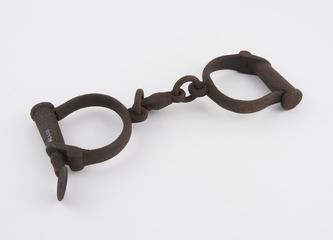 Iron handcuffs, English, 1850-1900