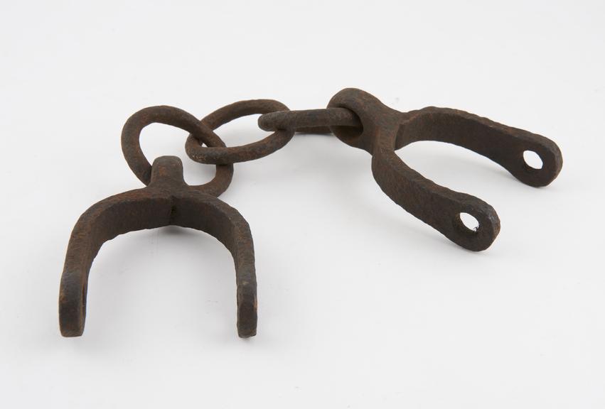 Pair of iron leg irons for prisoner, European, 1501-1800