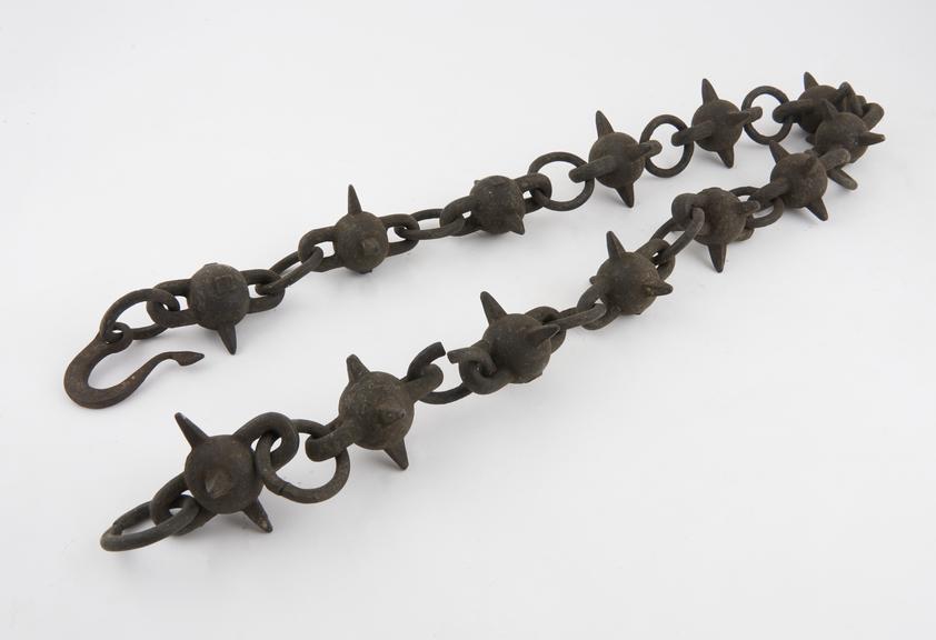 Spiked iron chain, application unknown, possibly French