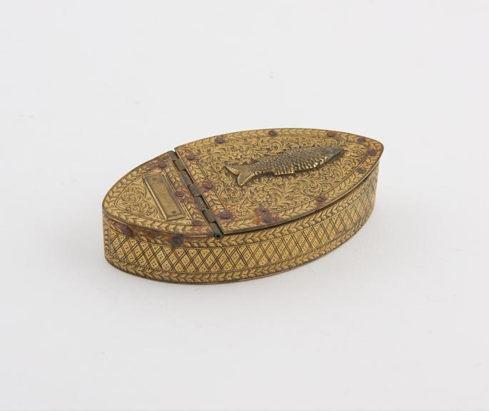 Gilt brass snuff box with figure of fish in bas-relief on