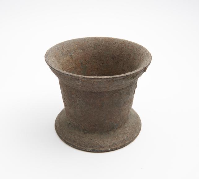 Small bell-shaped iron mortar, wide flard rim