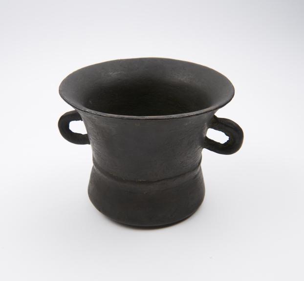 Bronze mortar, bowed base, bell shaped, 2 rounded handles
