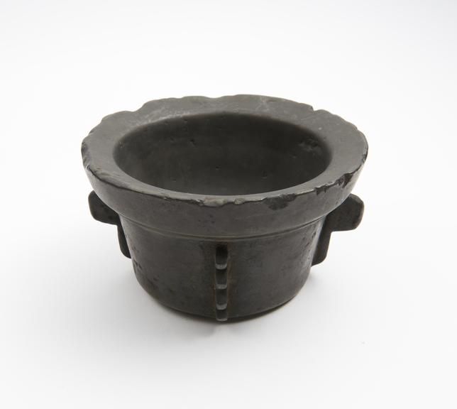 Wide bronze mortar, everted rim, flat base