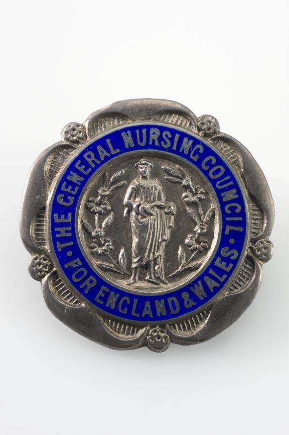 Silver and blue enamel badge of The General Nursing Council for