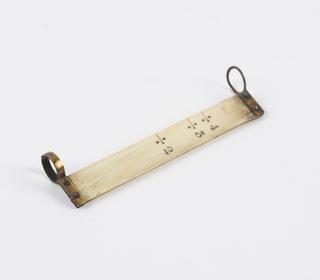 Rectangular scale, support rings each end