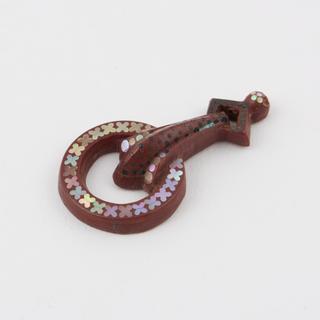 Parkesine brooch with intricate inlaid crosses design