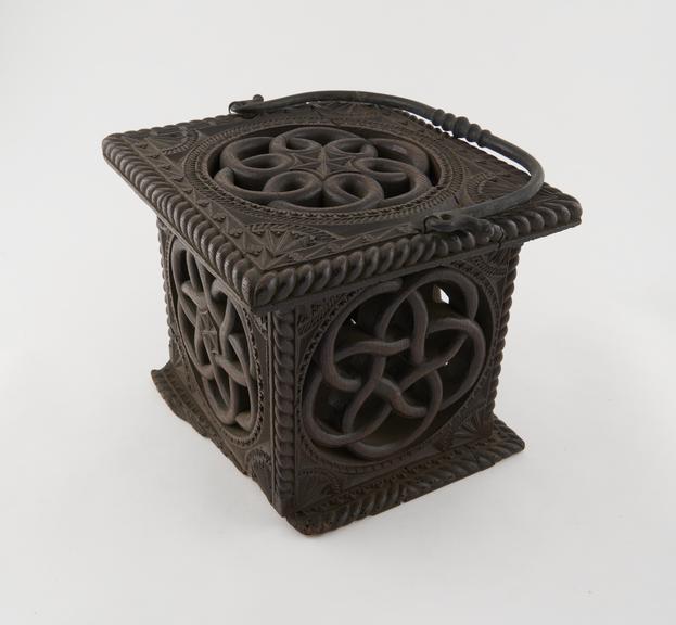 Container, wood with metal handle, ornate decoration