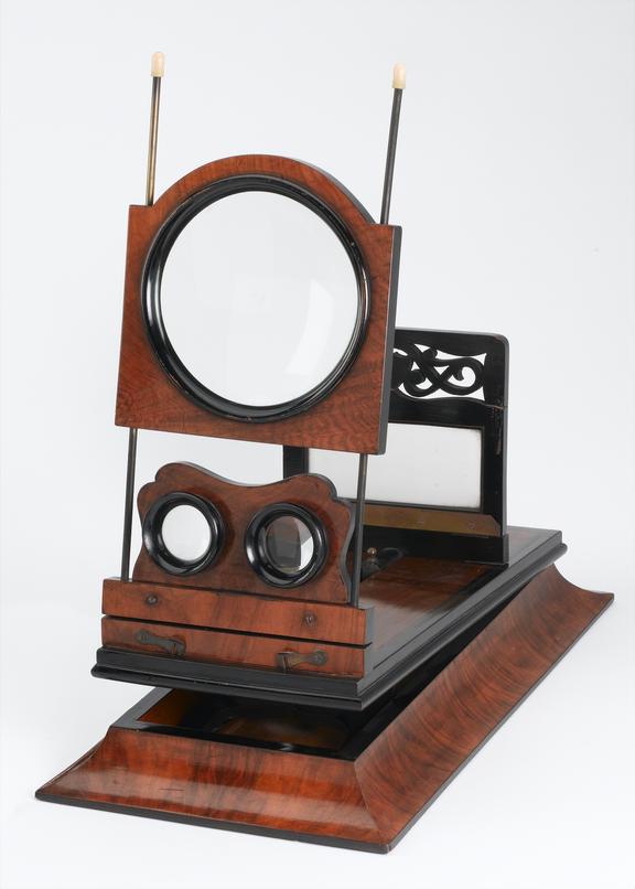 Table stereoscope with 49 glass stereoscope views