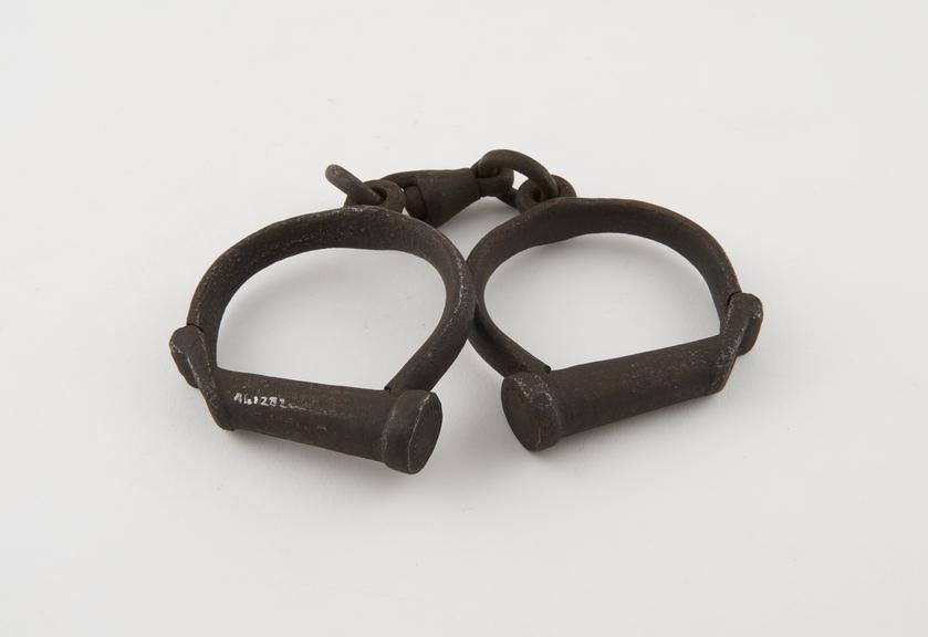 Pair of handcuffs, iron, English, 19th century