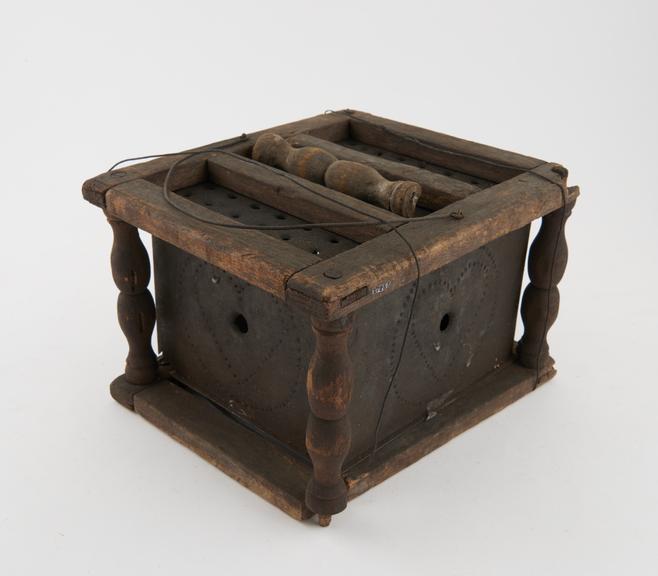 Tin charcoal burner in wooden frame, rectangular