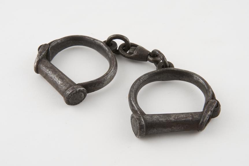 Handcuffs, iron, by Nichol, English, 19th century