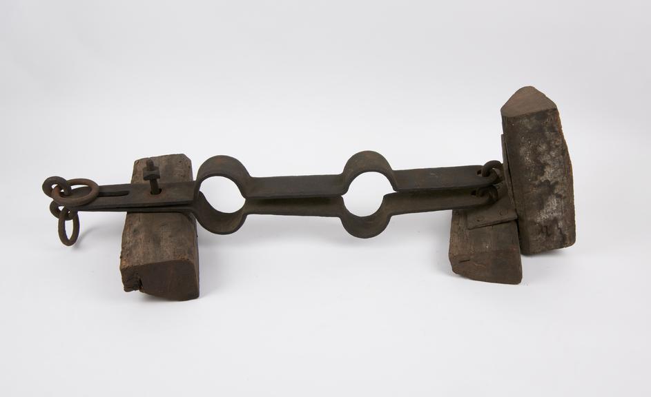 Stocks for humiliation of criminal, iron and wood, European