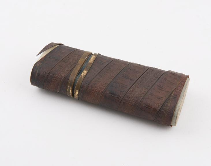 Cardboard cigar case with brass flange and rims and leather