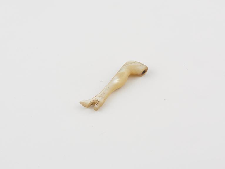 Mother of pearl pipe tamper in form of female leg