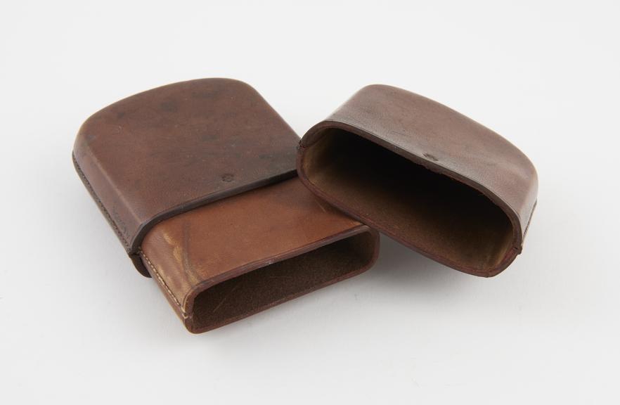 Leather cigar case, rectangular with rounded edges and ends