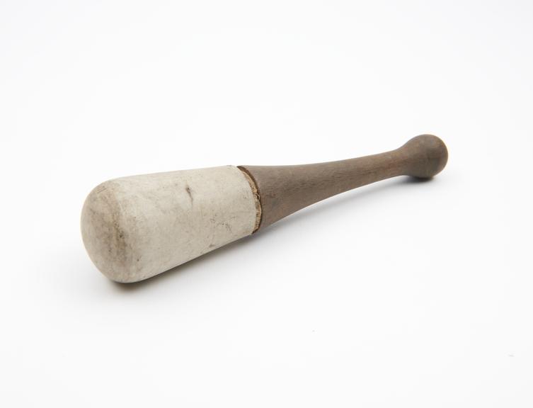 Ceramic pestle with wooden handle, English, 1870-1930