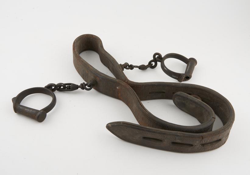 Belt with attached manacles, reputedly from Dartmoor Prison