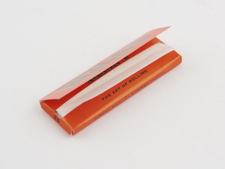 Red packet of 50 Rizla medium weight rolling papers for hand