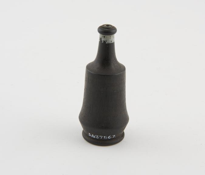 Wooden bottle shaped container with screw on lid, English