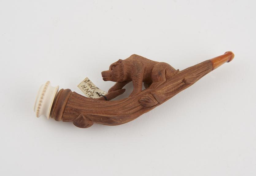 Wooden cigar holder with stem carved in the shape of a bear