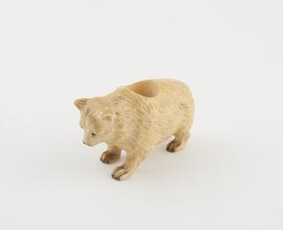Plastic composition match holder in form of a bear