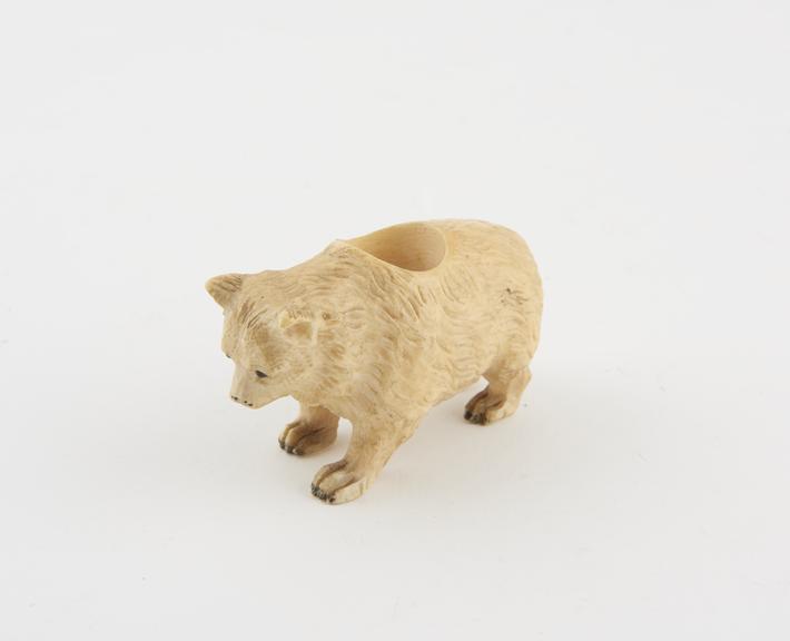 Plastic composition match holder in form of a bear