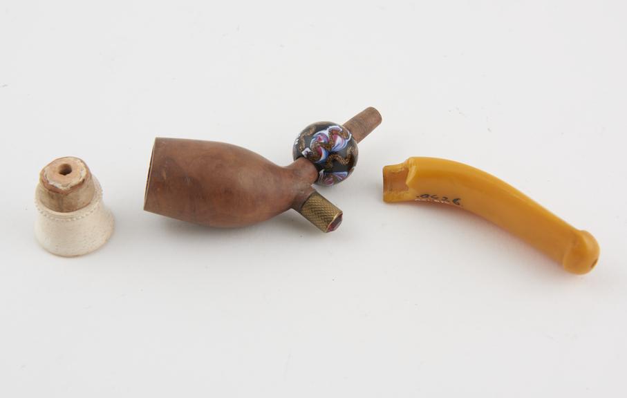 Wooden cigar holder in the form of a clay pipe bowl with amber