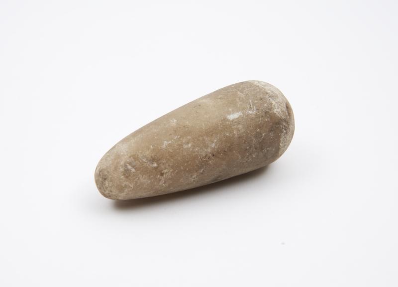 Stone pestle, cylindrical with rounded grinding end