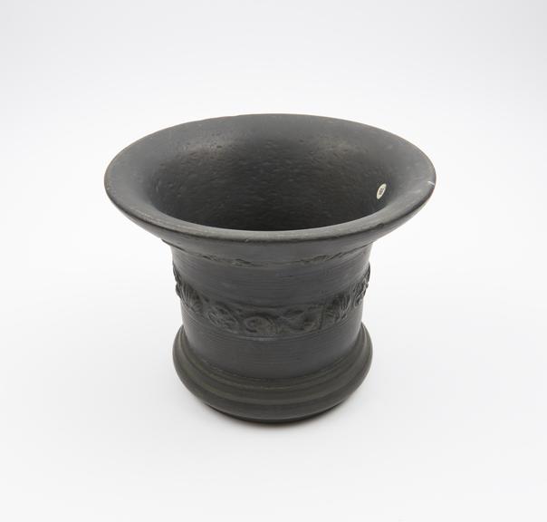 Bronze bell-shaped mortar with flared rim