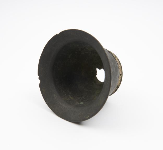 Squat bronze mortar, hole in base and side, smooth plain sides